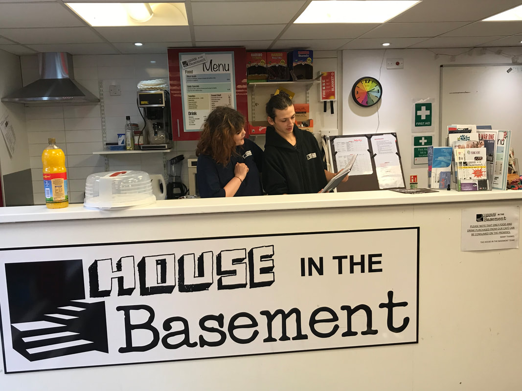 Image showing two youth Volunteers in the Kitchen Space of House in the Basement Youth Cafe