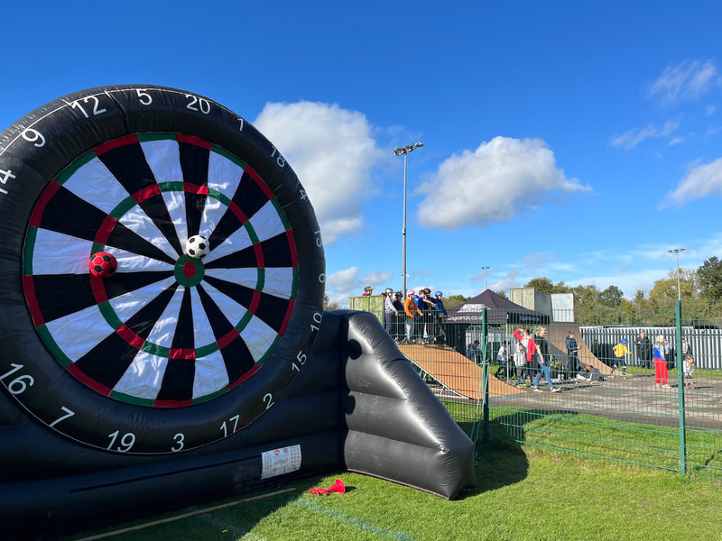 Image shows House in the Basements Inflatable dartboard at the Re-opening of Greatness Skate Park.